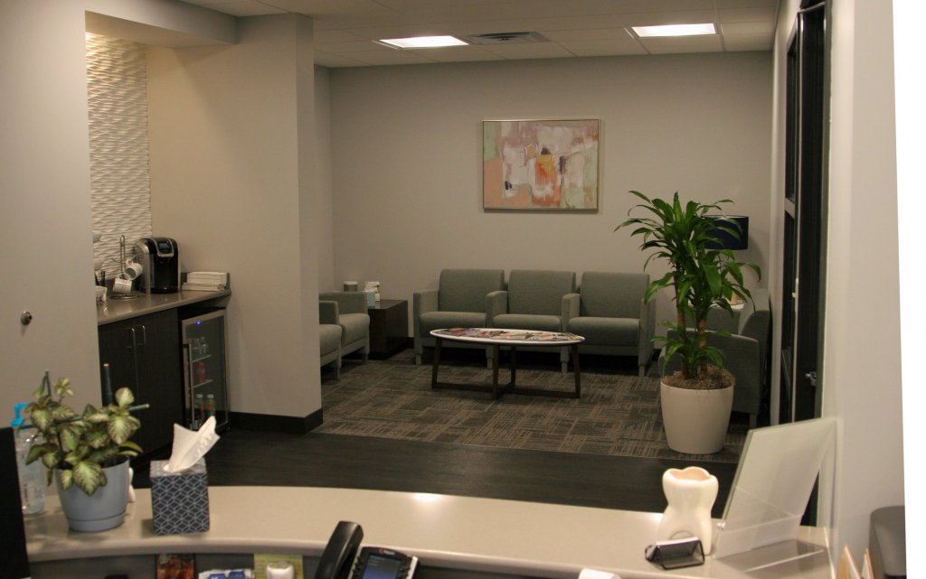 Interior photo: Columbia SC Prosthodontics practice Reception Desk & Refreshments in the Waiting Room